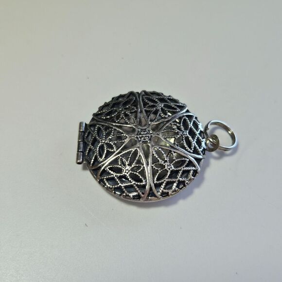 Silver tone round filigree locket - Picture 8 of 9